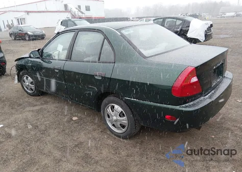 2001 Mitsubishi Mirage Es z USA, uszkodzony, nr VIN JA3AY26C61U007053